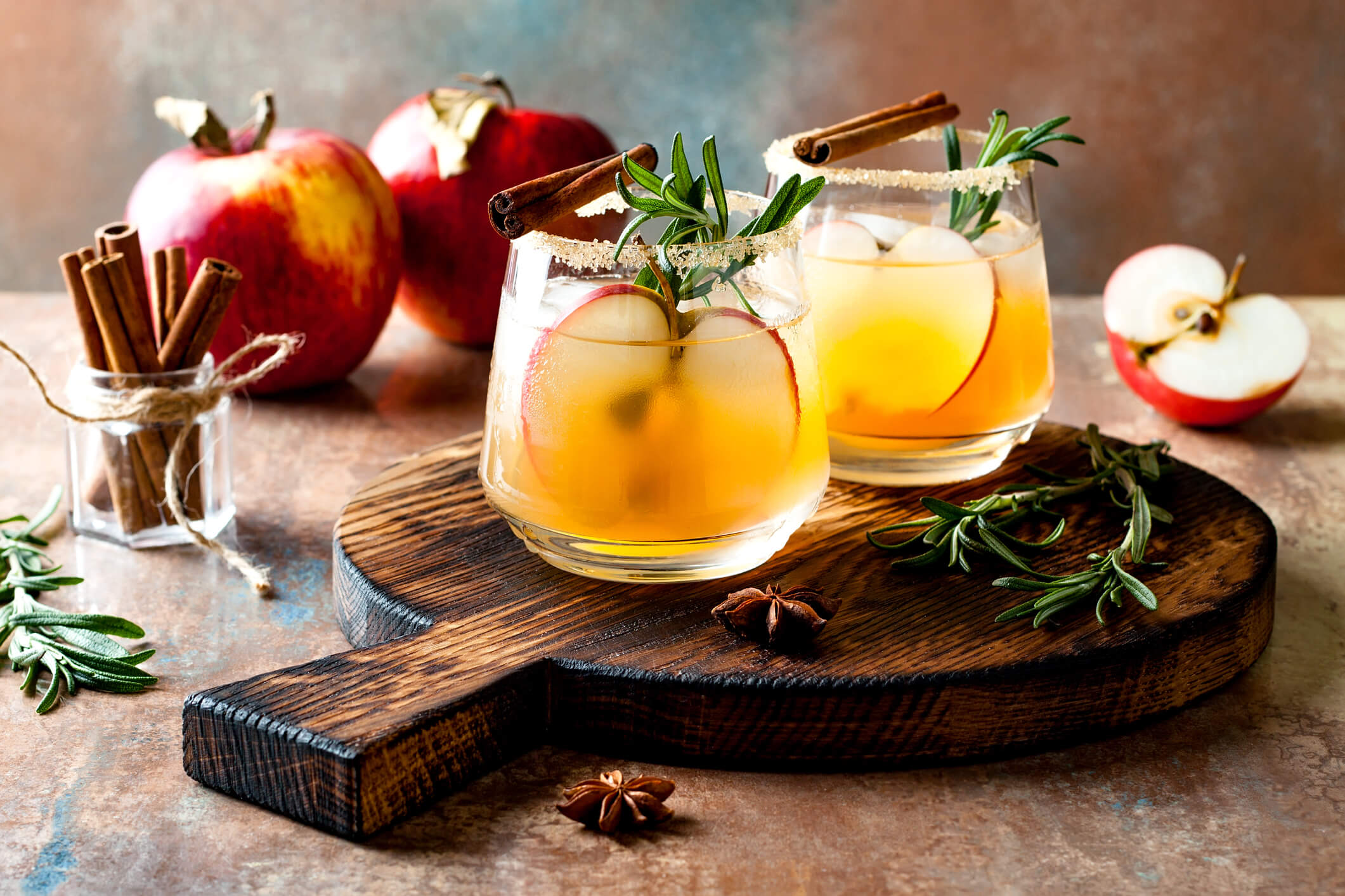 Glasses full of apples in cocktails